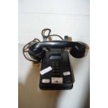 Vintage wall mounted telephone
