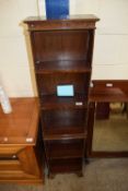 Narrow mahogany veneered five tier book case