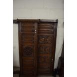 Pair of late 19th/early 20th Century carved oak Gothic style bed end decorated with linen fold