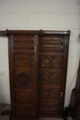 Pair of late 19th/early 20th Century carved oak Gothic style bed end decorated with linen fold