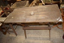 Stained pine trestle type table