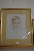 Portrait of a boy in a yellow tie, pastel, indistinctly signed, framed and glazed