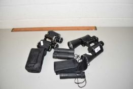 Mixed Lot: Assorted binoculars and a large vintage wooden ruler