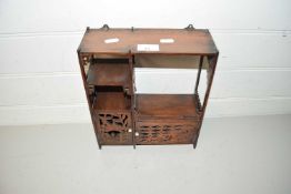 Small 20th Century Oriental table top cabinet with pierced decoration to the doors