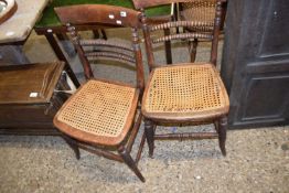 Pair of Regency simulated rosewood cane seated bedroom chairs