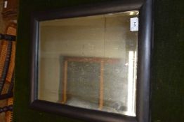 Rectangular wall mirror in a dark finish frame