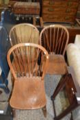 Set of three elm seated stick back kitchen chairs