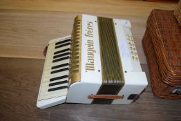Vintage piano accordion marked Maugein Freres