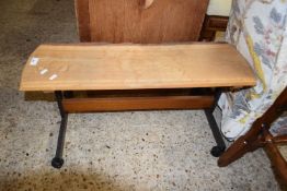 Narrow live edge wooden table on metal wheeled base