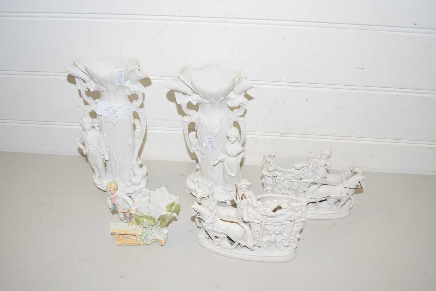 Collection of various white porcelain figural vases
