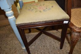 Mahogany framed floral upholstered stool with X formed stretcher