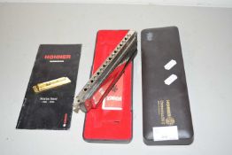 Hohner cased harmonica