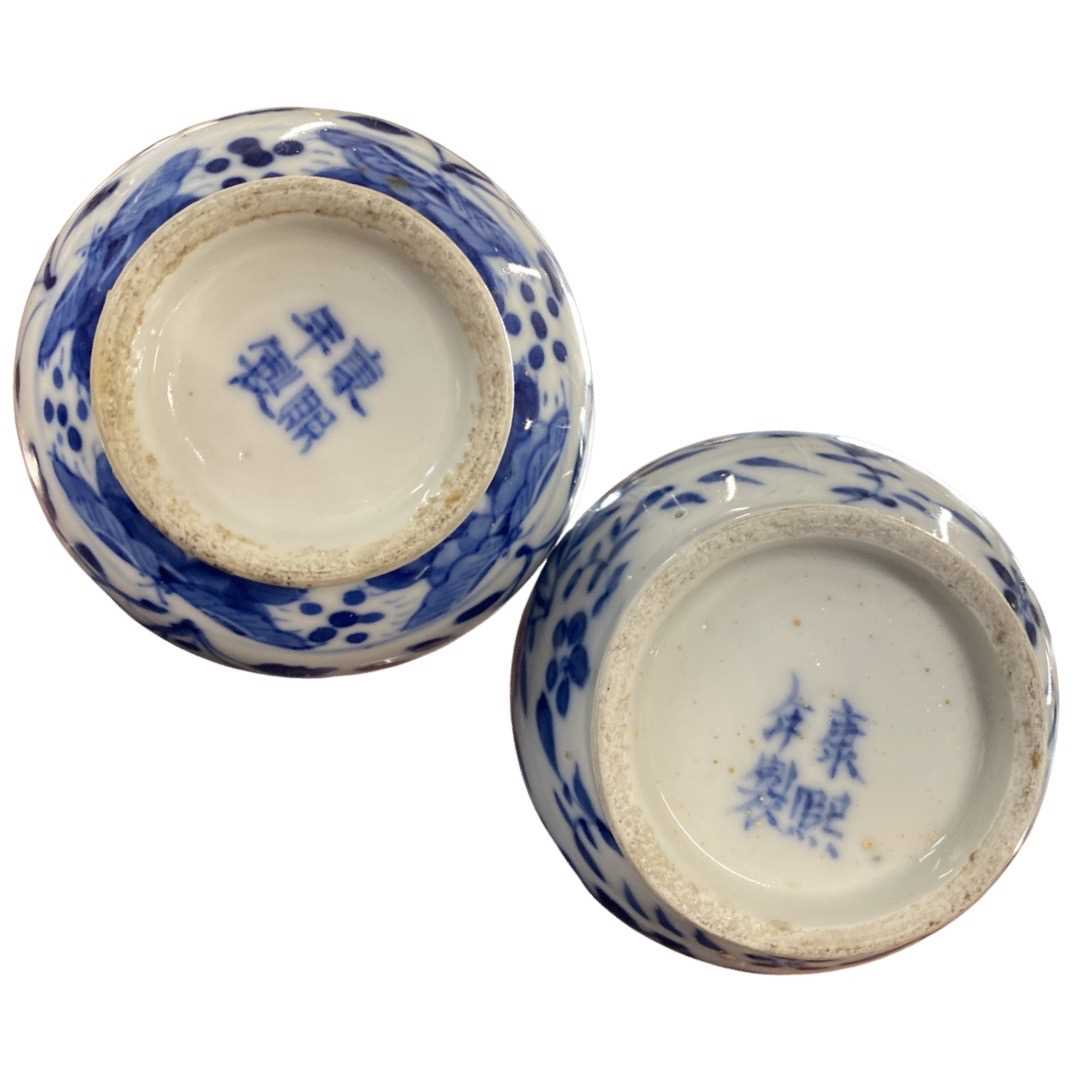 Pair of Chinese porcelain bottle vases with blue and white design of dragons, 15cm high (chip to rim - Image 3 of 3