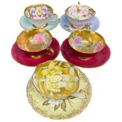 Group of Paragon five cups and saucers all with floral designs two with gilt interiors