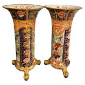 A pair of early 20th century Copeland Spode cylindrical vase of lobed form with an Imari design