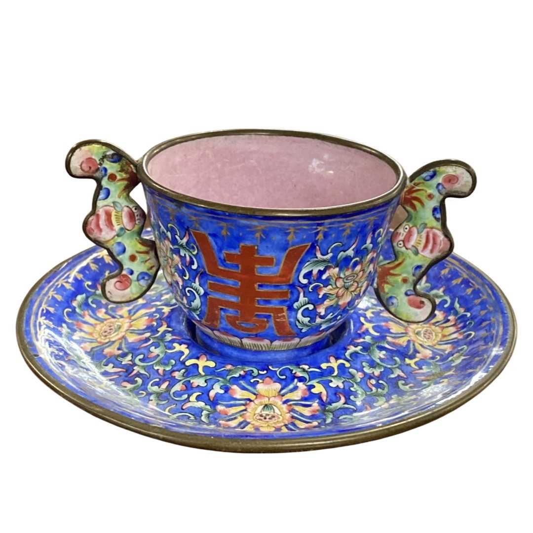 Chinese cloisonne trembluese cup and saucer, the blue ground with floral designs and zhou symbol