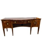 George III mahogany serpentine sideboard with inlaid decoration fitted with two doors, a single