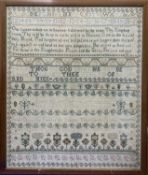 Framed sampler with Lords Prayer and religious text dated 1784