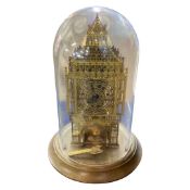 Brass big ben skeleton clock under a glass dome