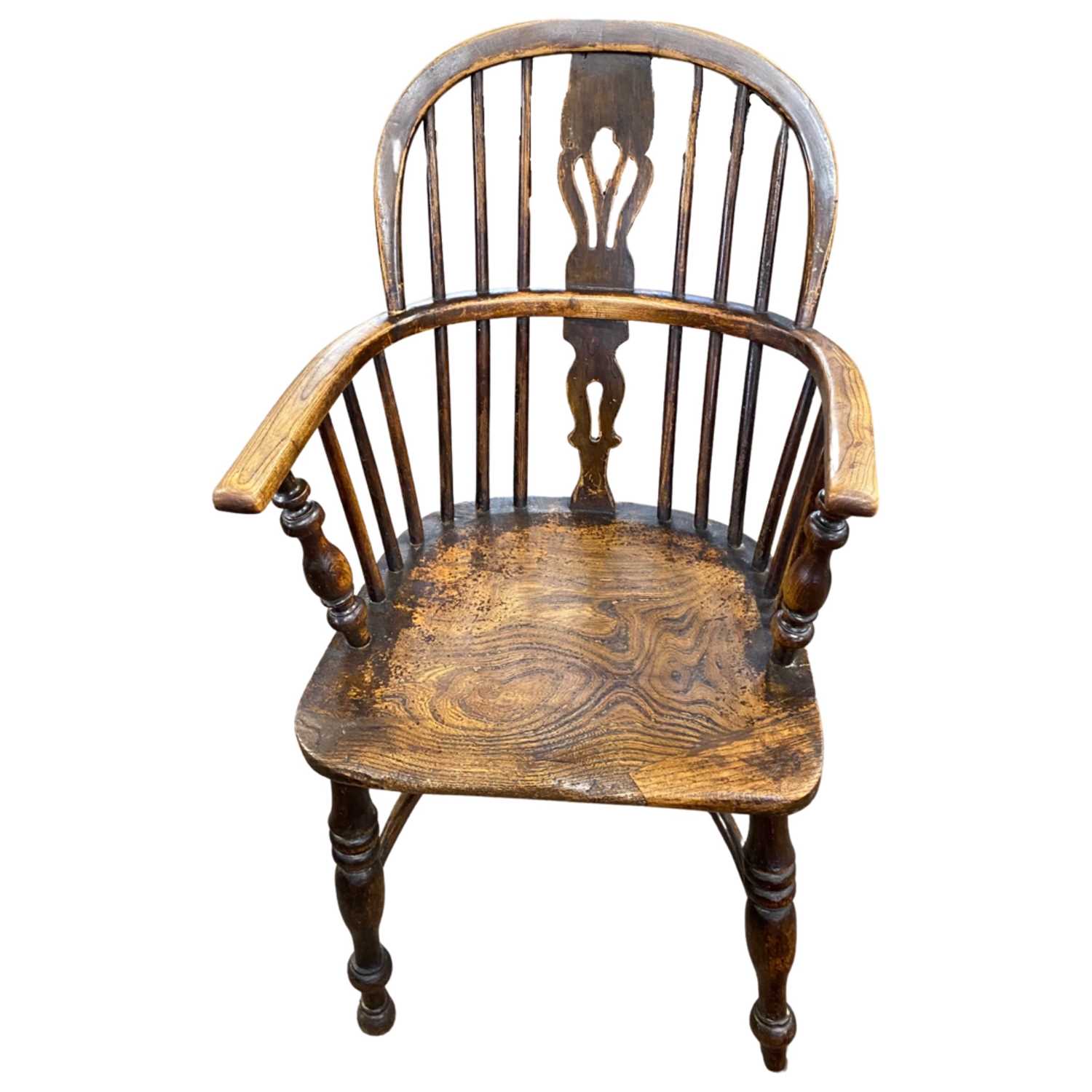 19th Century elm seated and stick back Windsor chair with crinoline stretcher raised on turned legs,