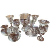 Quantity of various glass wares, wine glasses, etc all with engraved designs