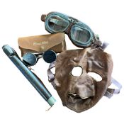 Plastic bag containing a Swanee whistle with pair of Claremont Clarke vintage sunglasses and leather