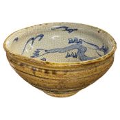 Chinese porcelain bowl, the exterior with a stepped brown glaze, the interior with a crackle