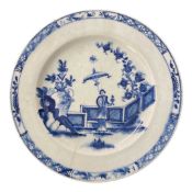 Lowestoft porcelain plate with the lady and parasol pattern, standing by a fence with vase with