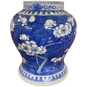 19th Century Chinese porcelain jar, the blue ground with prunus decoration, 15cm high, four