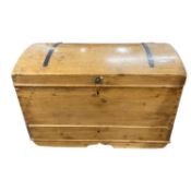 Large Victorian pine dome topped trunk with hinged lid opening to a fitted interior over a base