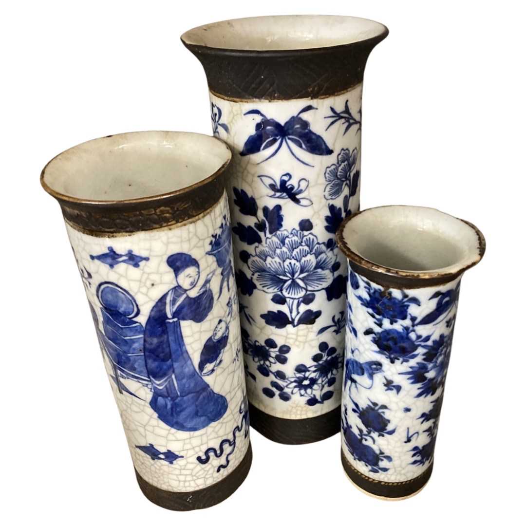 Group of three Chinese porcelain crackle ware vases of cylindrical shape with designs of flowers and