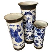 Group of three Chinese porcelain crackle ware vases of cylindrical shape with designs of flowers and