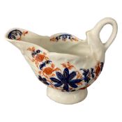 Lowestoft porcelain dolphin shaped creamer with Imari style decoration (crack)