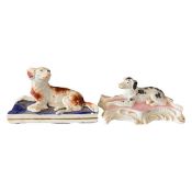 Mid 19th Century figure of a dog on rectangular blue base, possibly Rockingham together with a