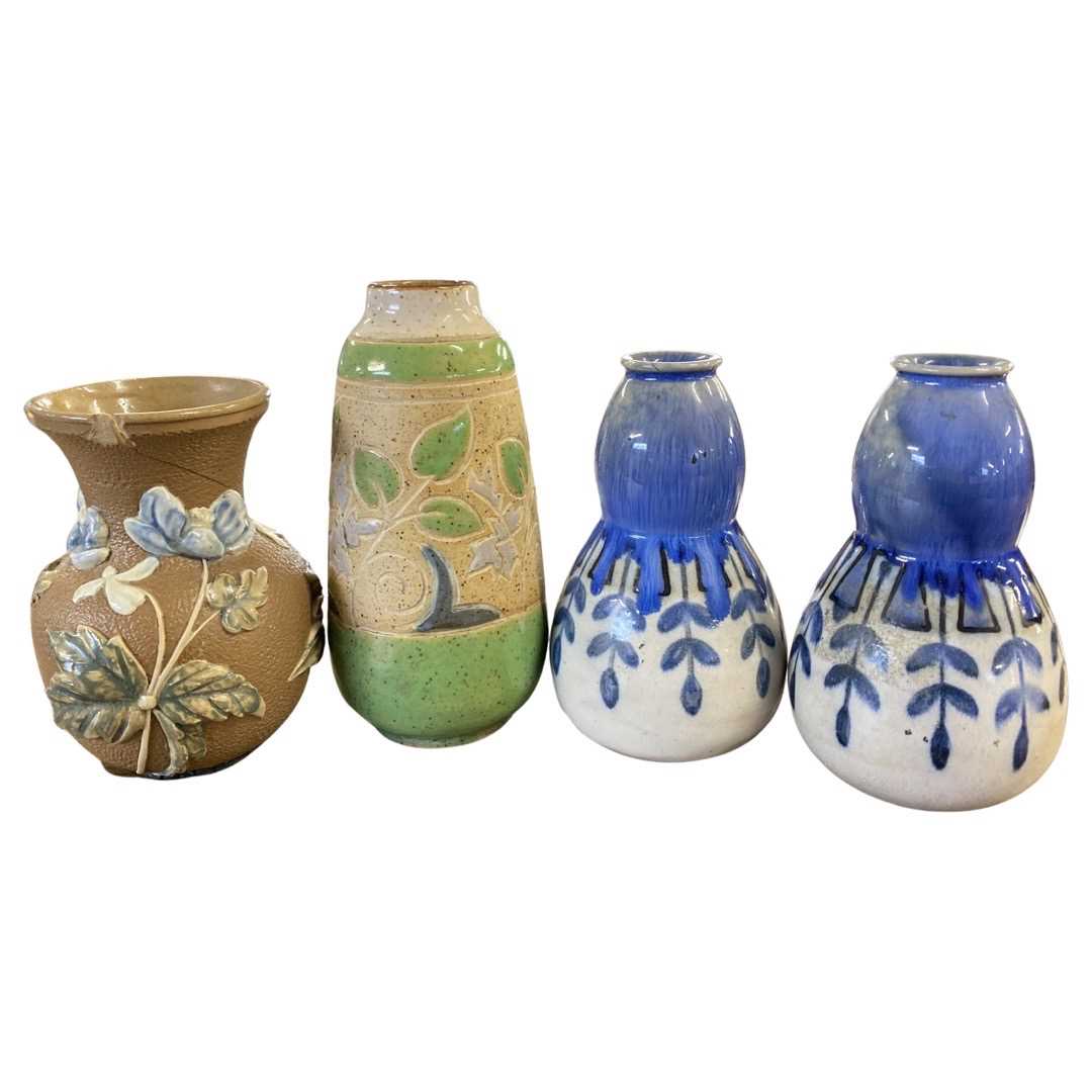 Group of Doulton stonewares including a vase with green floral decoration by Vera Huggins, small
