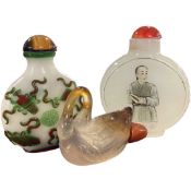 Group of three snuff bottles with painted designs, one shaped as a swan (3)