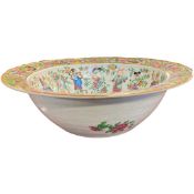 Large Cantonese porcelain bowl with polychrome design of Chinese figures within a famille rose rim