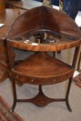 19th Century mahogany corner wash stand of bow front form with galleried top with three apertures