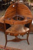 19th Century mahogany corner wash stand with galleried back and three apertures fitted with a single