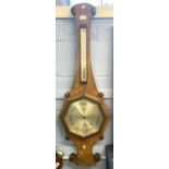 West, London Victorian barometer and thermometer combination, set in a polished oak frame, 102cm