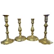 Pair of Queen Anne style brass candlesticks together with a further pair