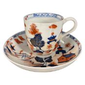 Lowestoft porcelain cup and saucer in the dolls house pattern (hairline to saucer)