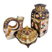 Group of Crown Derby models including one of a goat, further jar and cover and small box and