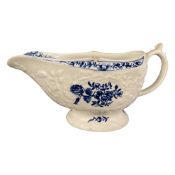 Lowestoft sauce boat with blue printed floral designs (chip to rim)