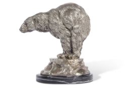 20th Century cast metal model of a Polar Bear set on a polished stone base 23cm tall