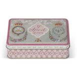 Tin containing wedding cake from the wedding of the then Prince of Wales and Duchess of Cornwall