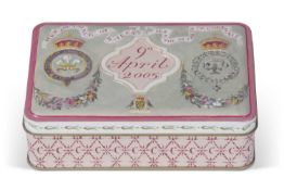 Tin containing wedding cake from the wedding of the then Prince of Wales and Duchess of Cornwall