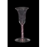 19th Century wine glass, the bell and bowl above a opaque twist stem with ruby collar twist, 15cm