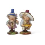 Pair of Derby style mansion house dwarfs probably Samson late 19th Century decorated in typical