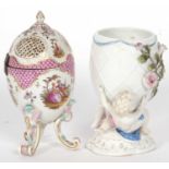 19th Century pot pourri vase and cover in the shape of an egg raised on three scroll feet painted